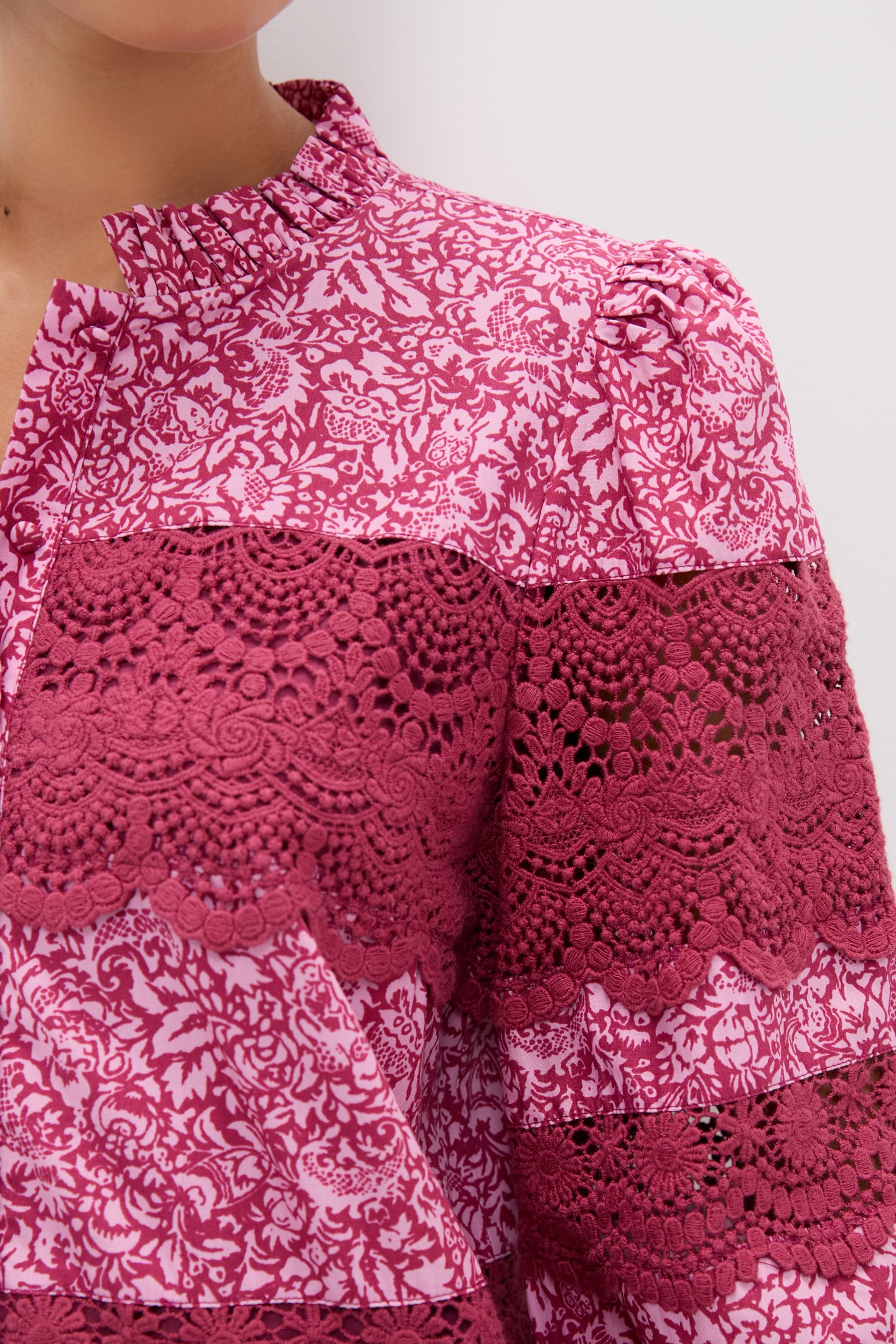 Lace Trim Maroon & Pink Floral Emmie Mini Dress showcases classic femininity with a ruffled stand collar, blouson sleeves, and intricate lace, offering an effortless, high-end style.