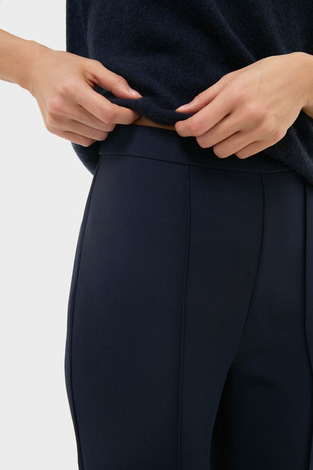 Navy Audrey Pants showcase a classic, slimming fit with an effortless style. Features a side seam zipper and pinched front seam, embodying high-end fashion.