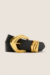 Black Cassian Belt with classic oversized gold-tone buckle and keeper, crafted from cowhide leather. Effortless, fun, and high-end accessory for versatile styling.