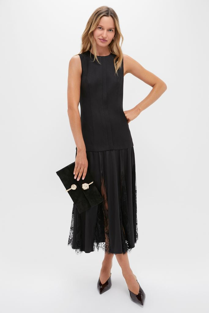 Model showcases classic, effortless style in Maplewood Loren Mid Heels, paired with a chic black top and lace-trimmed skirt, exuding high-end, fun sophistication.