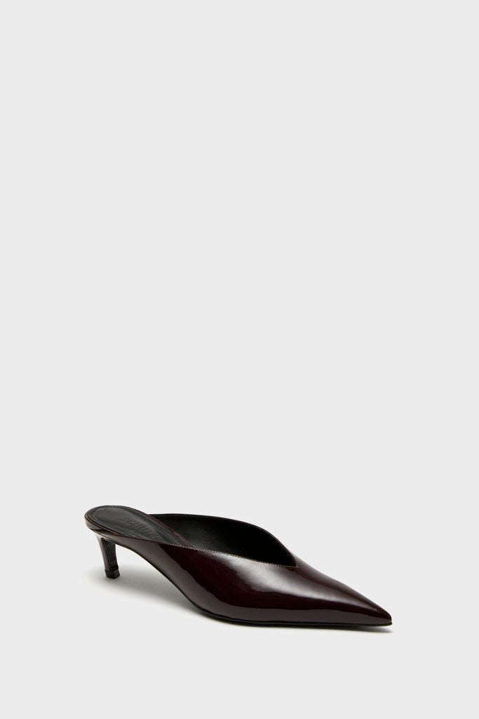 Maplewood Loren Mid Heels: A classic, effortless women’s slip-on mule in glossy burgundy patent, featuring a pointed toe and low kitten heel, exuding fun, high-end style.