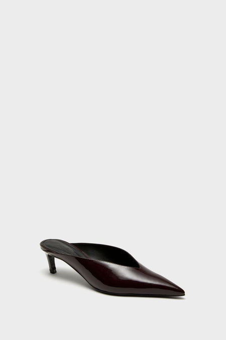 Maplewood Loren Mid Heels: A classic, effortless women’s slip-on mule in glossy burgundy patent, featuring a pointed toe and low kitten heel, exuding fun, high-end style.