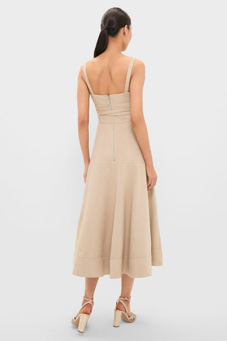 Dune Suede Kendra Maxi Dress showcases a classic, effortless style with its fitted bodice and flared skirt, complemented by high-end strappy block-heeled sandals.