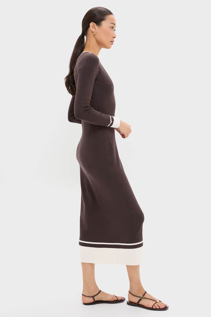 Woman in classic Espresso Egret Long Sleeve Ribbed Maxi Dress with white trim, styled effortlessly with sandals. Perfect high-end look for a fun, confident outing.