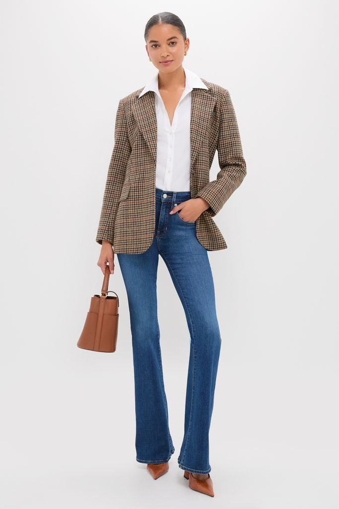 Woman wearing classic Butterscotch Michelle Slingback Heels, styled with an effortless blazer, jeans, and bucket bag. Fun, high-end look perfect for versatile elegance.