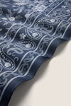 Navy Floral Bandana Medium Silk Scarf, featuring classic white paisley and floral motifs. An effortless, high-end accessory for versatile styling and fun fashion elevation.
