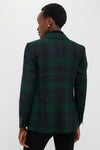 Back view of a person wearing a classic Green Navy Multi Tartan Brushed Wool Blazer, showcasing effortless style with its notched collar and buttoned cuffs.