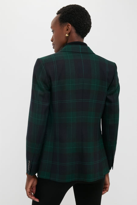 Back view of a person wearing a classic Green Navy Multi Tartan Brushed Wool Blazer, showcasing effortless style with its notched collar and buttoned cuffs.