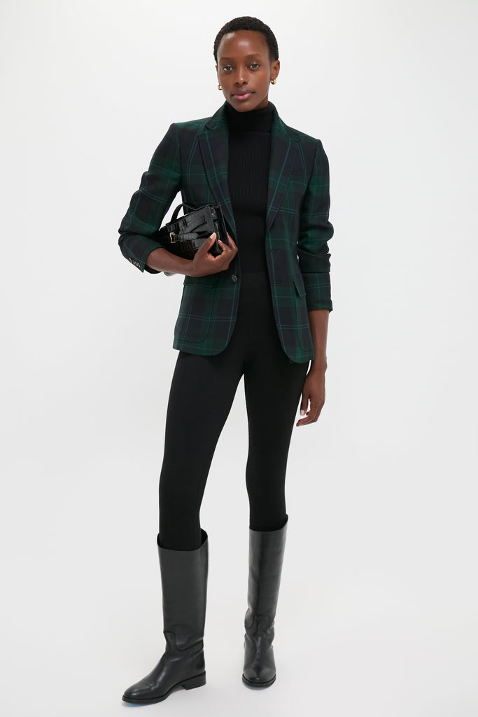 Woman in a classic Green Navy Multi Tartan Brushed Wool Blazer paired with a black turtleneck, exuding an effortless, high-end style with fun elegance.