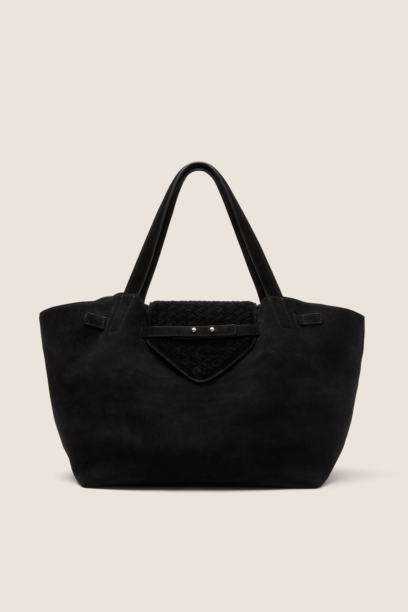 Black Suede Blaine Tote with broad shoulder straps, quilted flap pocket, and gold-tone studs; a classic, high-end work bag blending effortless style with practical design.