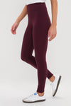 Winetasting High Rise Long Compression Spandex MacKenzie Legging paired with white sneakers, showcasing a classic, effortless fit for a fun, high-end look.