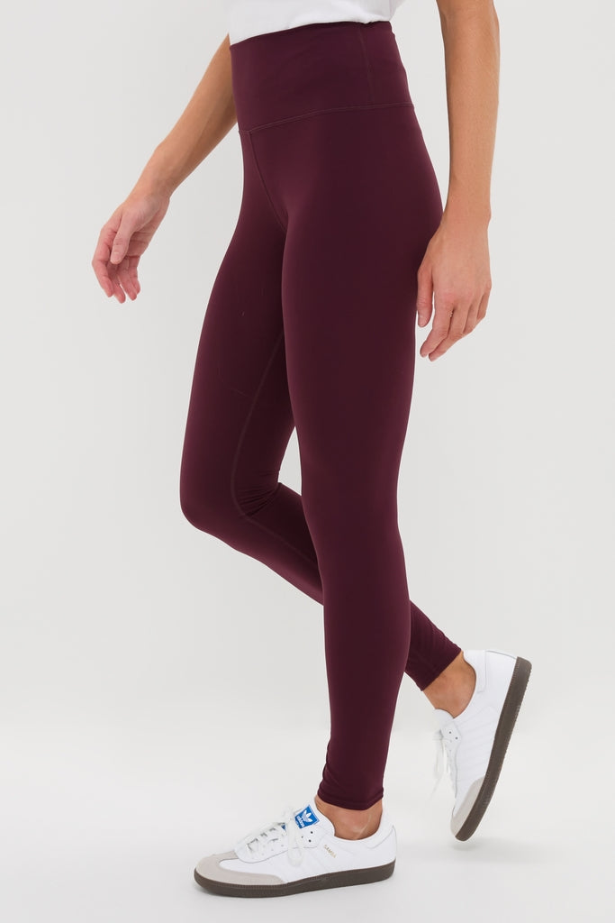 Winetasting High Rise Long Compression Spandex MacKenzie Legging paired with white sneakers, showcasing a classic, effortless fit for a fun, high-end look.