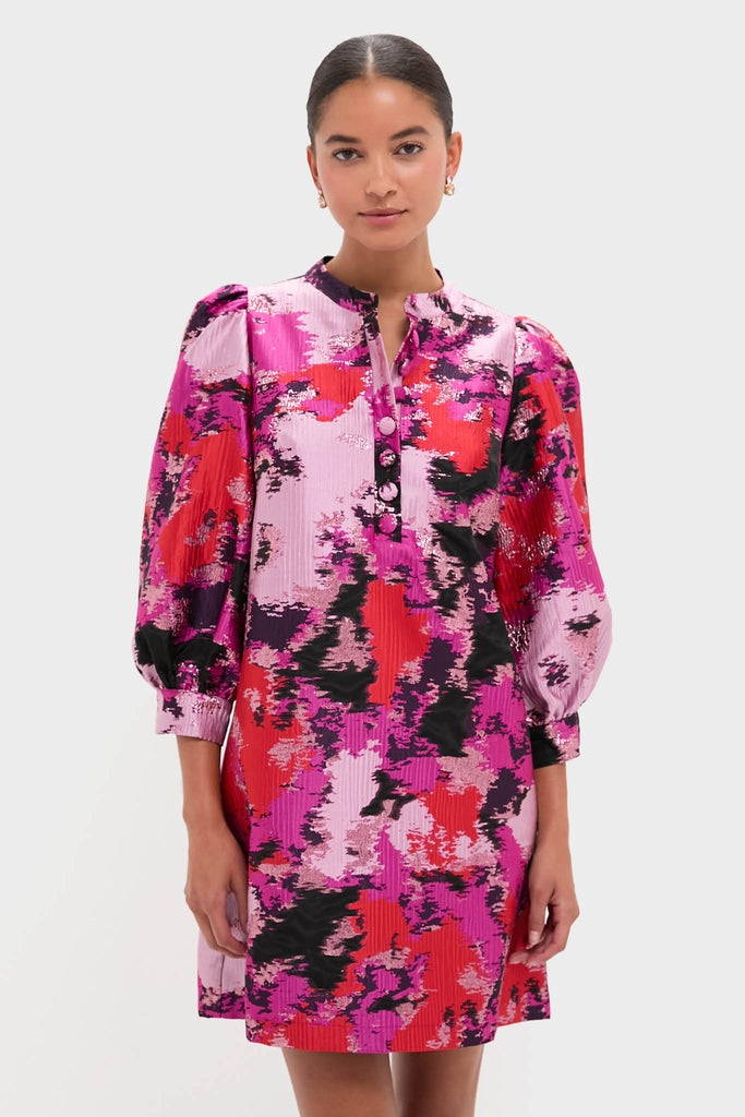 Woman wearing the Pink and Red Lurex Abstract Jacquard Samantha Dress with puff sleeves and button placket, exuding a classic, effortless, and high-end style.