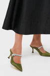 Fern Satin Mae Heels: Classic, high-end slingback mules with an effortless mule silhouette, featuring a crystal-encrusted strap and slim stiletto heel, perfect for fun occasions.