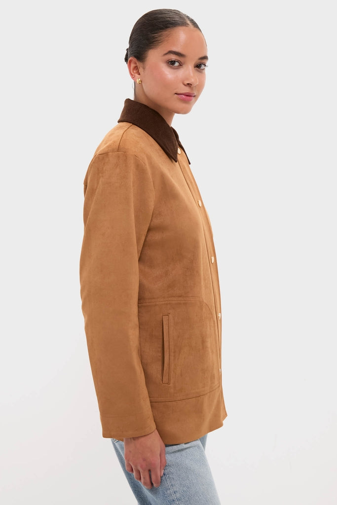 Young person wearing the classic Chestnut Faux Suede Cody Jacket with a contrasting collar and snap-button front, epitomizing effortless, high-end style for a fun, confident look.