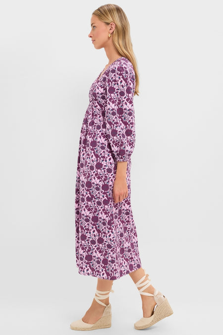 Model wearing the Mauve and Wine Floral Chloe Midi Dress with a V-neck and three-quarter balloon sleeves, paired effortlessly with beige espadrille wedge sandals for a classic, high-end look.