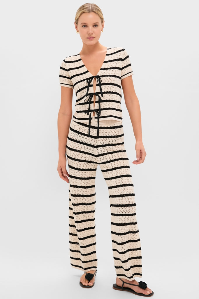 Effortlessly classic, the Black & Tan Stripe Portimao Top features a flattering V-neck and tie closures, perfectly paired with high-end wide-leg trousers for fun, stylish travel.