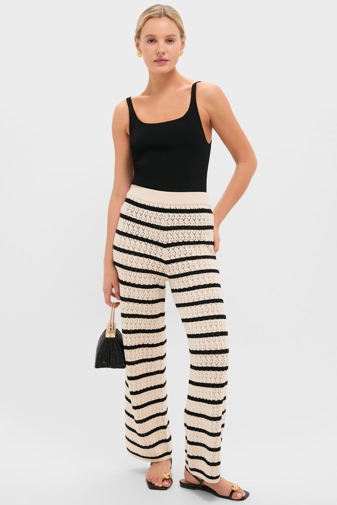 Black & Tan Stripe Portimao Pants offer a classic, effortless look with a high-end feel, featuring a ribbed waistband and slight flare, perfect for fun getaways.