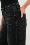 Close-up of Silver Screen Lexi Bowed Straight jeans with mid-rise, rhinestone details, and classic clean hem, offering an effortless, high-end look with a fun, shimmering touch.