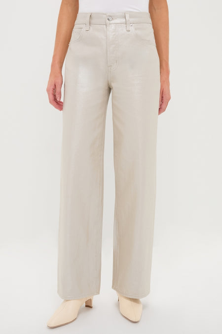 Champagne Luster Tate High Rise Bowed Wide Leg jeans exude effortless elegance with their classic high-waist and wide-leg style, featuring a fun, high-end pearly sheen.