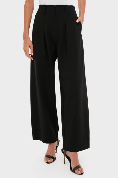 Night Out Eden Pleated Ponte Trouser, high-waisted and wide-leg, paired with strappy sandals, offers classic, effortless style with sharp pleats for a fun, high-end look.