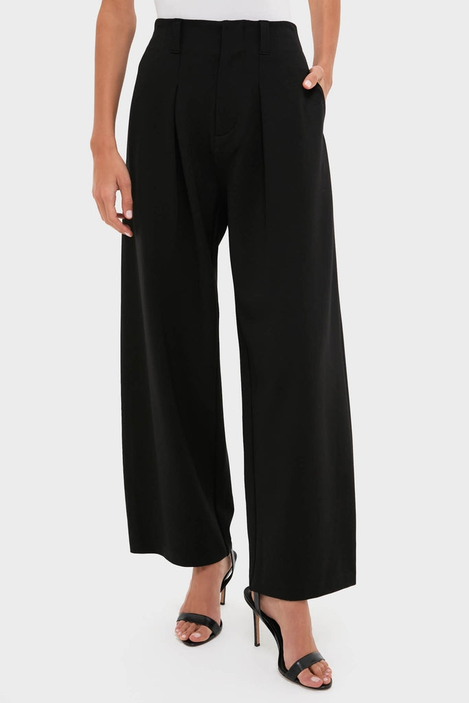 Night Out Eden Pleated Ponte Trouser, high-waisted and wide-leg, paired with strappy sandals, offers classic, effortless style with sharp pleats for a fun, high-end look.