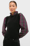 Tartan Ella Sweater Blouse: A classic, effortless holiday top featuring a black knit vest over a plaid blouse, perfect for a fun, high-end look.