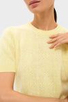 Lemongrass Brushed Merino Wool Puff Sleeve Lexie Sweater, featuring a classic diamond knit pattern and effortless puff sleeves, exudes fun and high-end style.