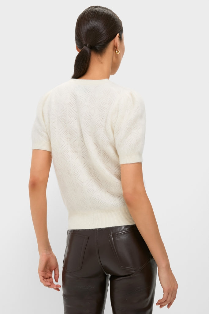 Model wearing the Ivory Brushed Merino Wool Puff Sleeve Lexie Sweater, showcasing classic, effortless style with fun puff sleeves and high-end diamond knit design.