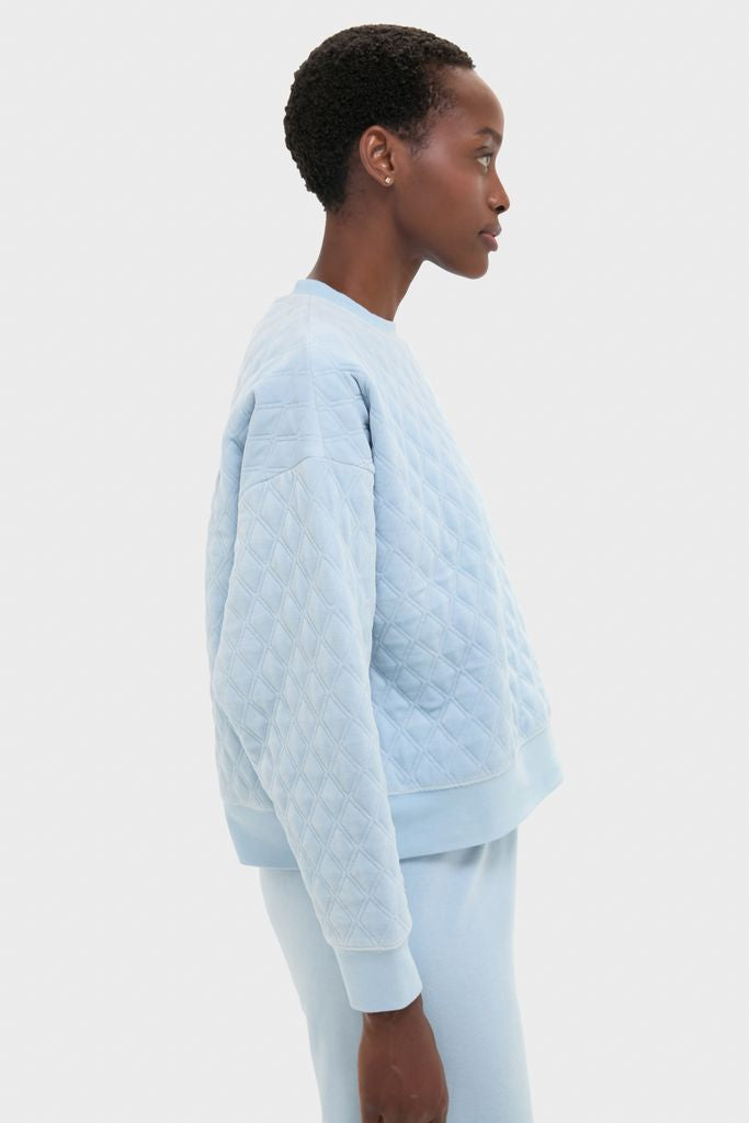 Effortlessly chic in high-end Blue Fog Velour Bennett Pullover; classic quilted design, relaxed fit highlights Tuckernuck’s fun, easy style. Perfect for versatile, confident loungewear.