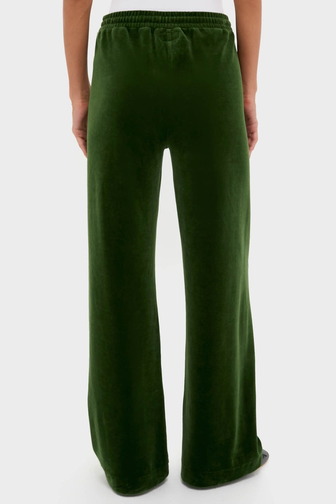 Back view of the Douglas Fir Velour Jane Pant, showcasing their classic, wide-leg silhouette and effortless high-end style with an elastic waistband and rear patch pocket.