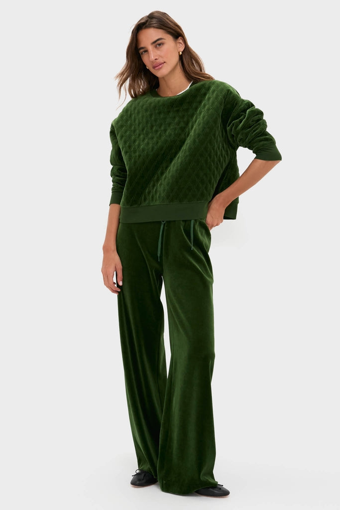 Model wears Douglas Fir Velour Jane Pant, a classic, relaxed-fit, high-end loungewear with wide-leg silhouette and elasticated waistband, perfect for effortless, fun, and chic comfort.