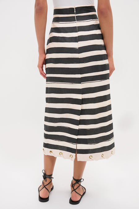 Model wearing Black Stripe Story Pencil Skirt, featuring classic wide stripes, effortless rope trim, and high-end tailored fit. Paired with black sandals and white top for a fun, polished look.