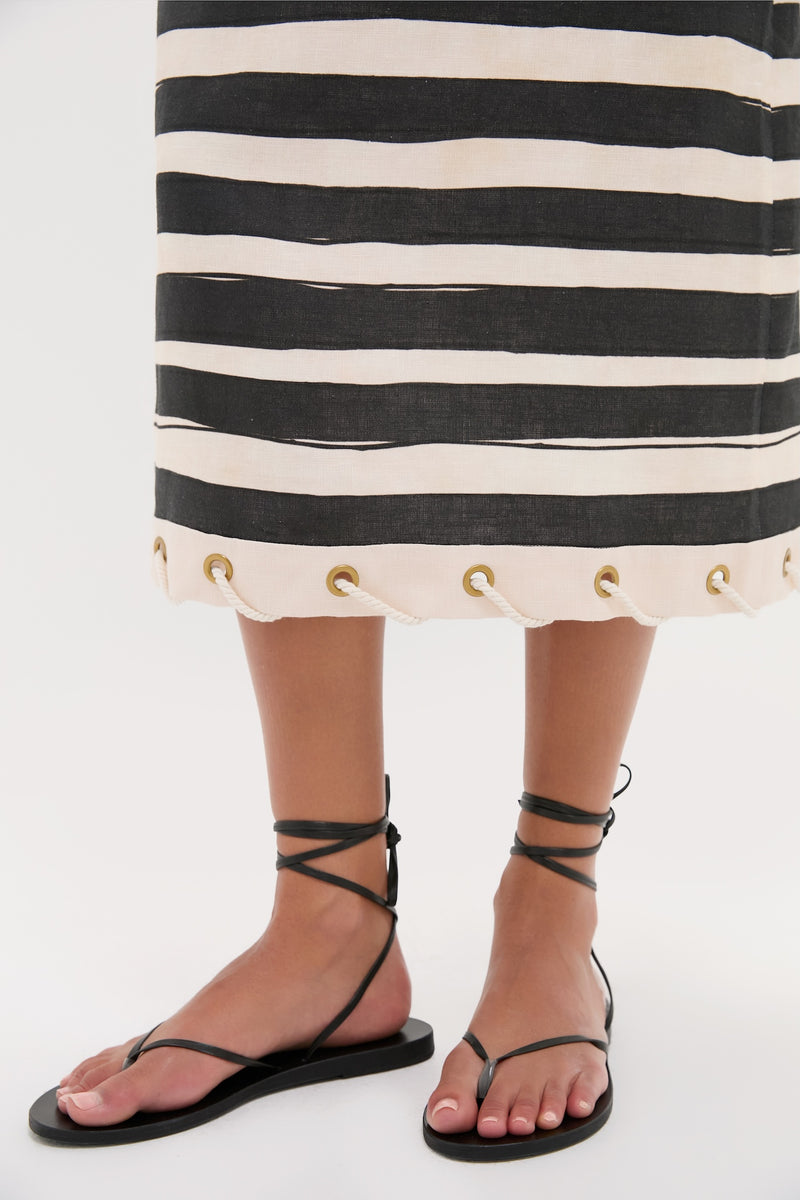Black Stripe Story Pencil Skirt, featuring classic rope-through-grommet details, paired with black sandals. Effortless and high-end, perfect for warm weather.