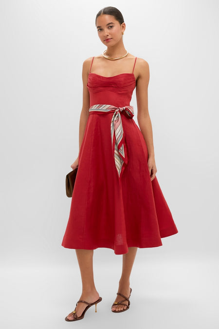 Model wearing the Red Rebellion Tuck Midi Dress, showcasing its classic, effortless style with a ruched bodice, flared skirt, and high-end details.