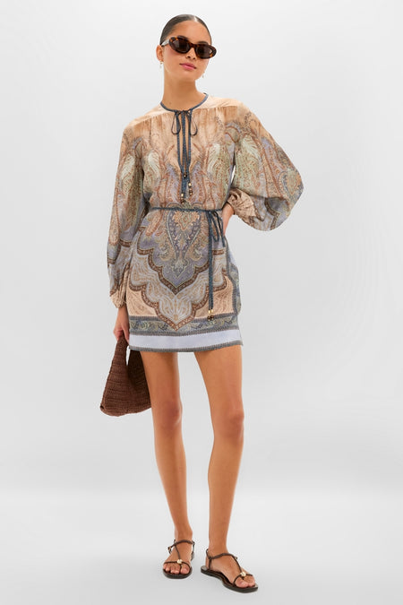 Model in a classic, high-end Tapestry Blue Multi Wanderlust Tunic with effortless, fun bohemian style, featuring paisley print, keyhole neckline, and billowed sleeves.