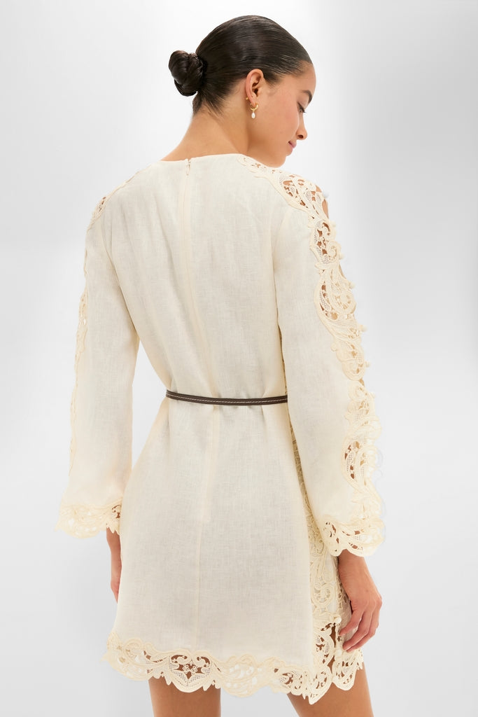 Cream Awaken Embroidered Tunic showcasing intricate scalloped lace trim, effortless style with a leather belt, and classic elegance for a high-end, fun, and confident look.