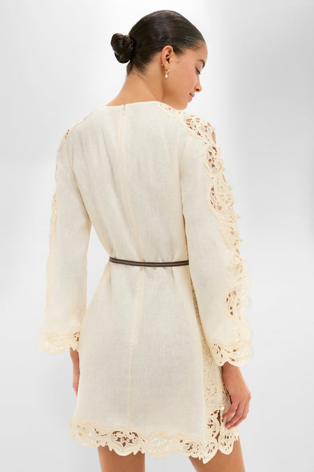 Cream Awaken Embroidered Tunic showcasing intricate scalloped lace trim, effortless style with a leather belt, and classic elegance for a high-end, fun, and confident look.