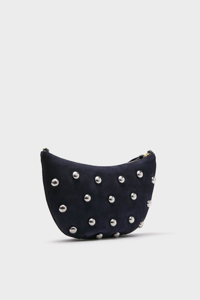 Navy Suede Lune Bag: A classic, half-moon clutch with effortless appeal, featuring high-end navy suede and fun silver studs, perfect for an elevated yet easy style.