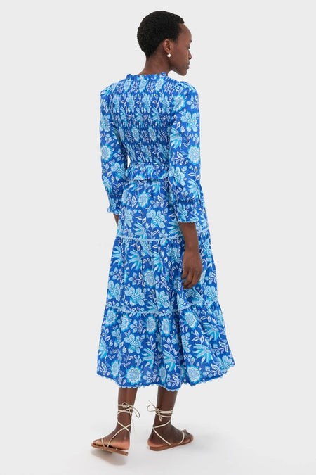 Ink Jaal Mia Dress: A classic, effortless midi dress featuring a smocked bodice, tiered skirt, and self-tie belt, styled with fun, high-end lace-up sandals.