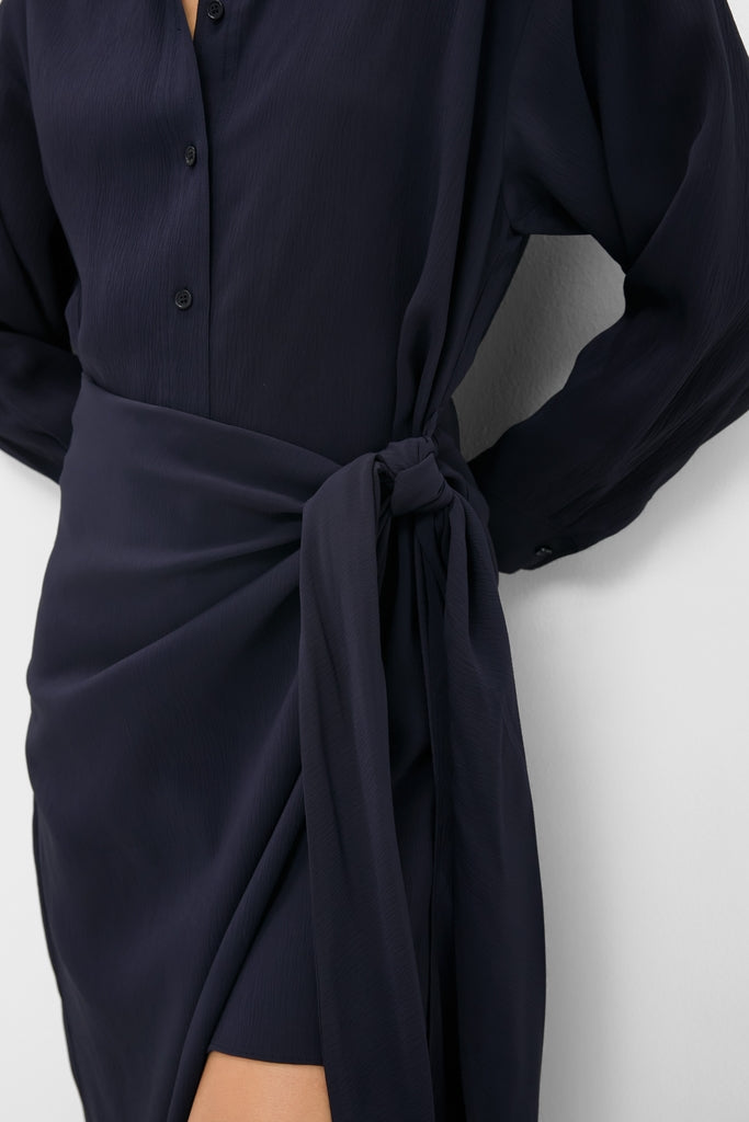 Midnight Alessandra Sarong Shirt Dress: classic, high-end navy blouse with button-front, long sleeves, and an effortless fabric tie, creating a fun wrap skirt effect.