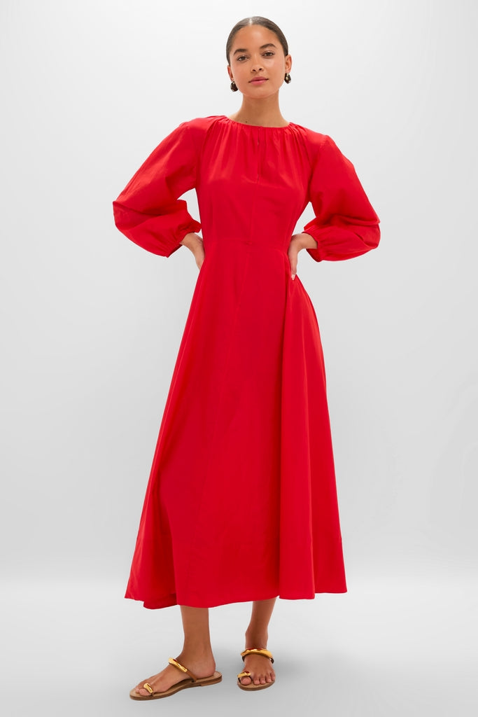 Tigerlily Bonita Dress: A classic, effortless maxi dress with a gathered neckline and billowy sleeves, embodying high-end style for fun, confident looks.