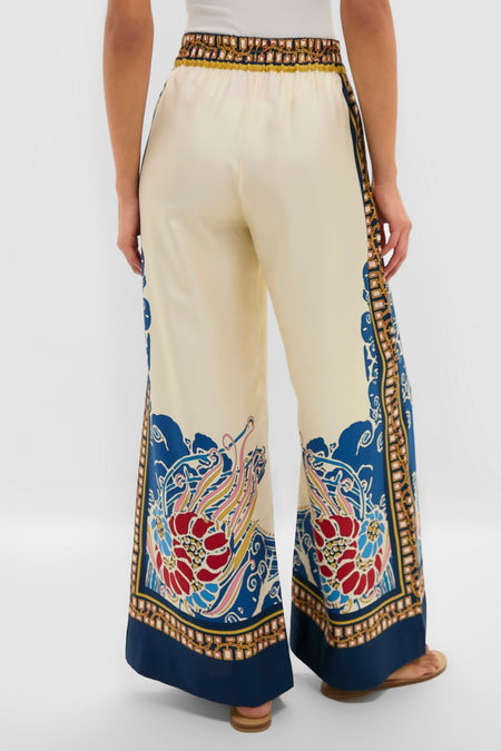 Effortlessly chic, these Lemuria Placee Palazzo Pants feature a classic wide-leg silhouette with an ornate print, offering a fun and high-end addition to your wardrobe.