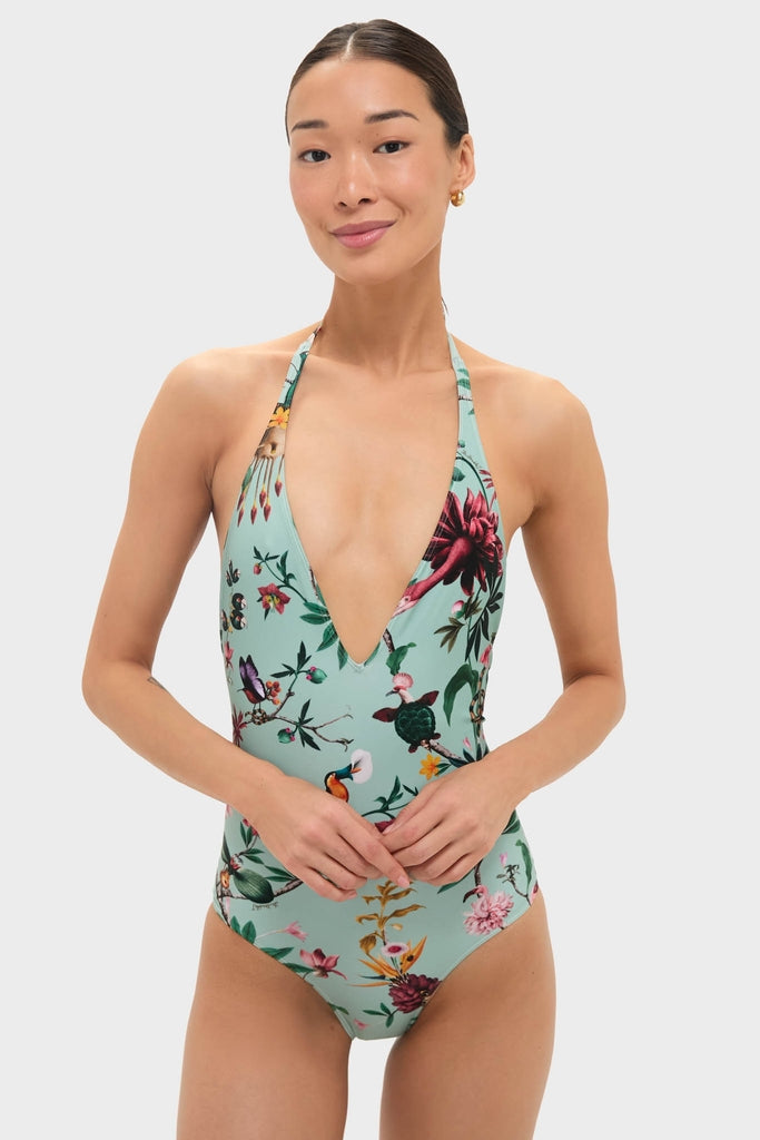 Zooflora One Piece Swimsuit, featuring an effortless classic halter-neck design with a plunging V-neckline, adorned with a fun botanical and bird print, embodying high-end confidence.
