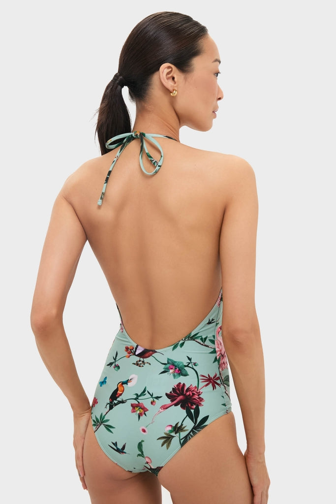Zooflora One Piece Swimsuit with a classic tropical print; features an effortless halter neck and low scooped back, embodying Tuckernuck's fun, high-end style.