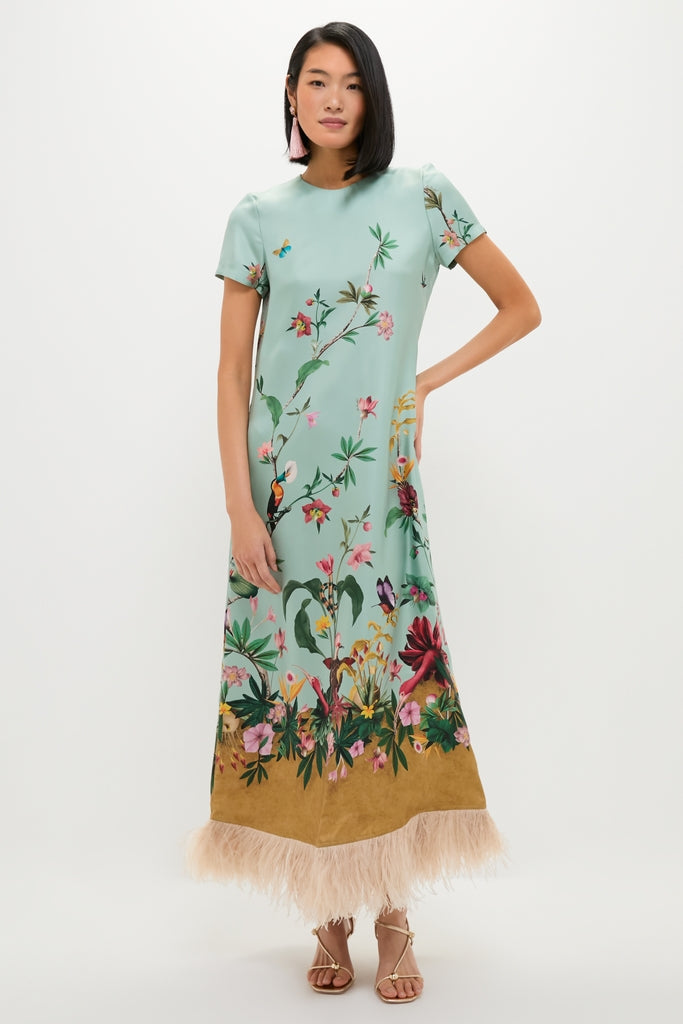 Zooflora Panel Swing Dress with Feathers: A classic, effortless high-end event dress featuring a botanical motif, side zip pockets, and fun blush-pink feather trim.