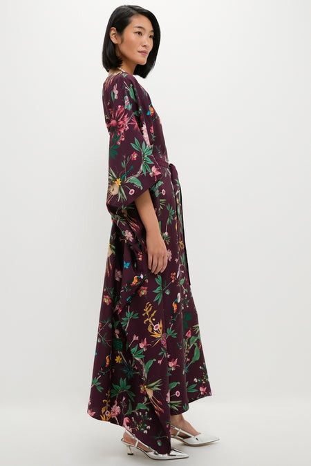 Model in a classic, high-end Zooflora Square Kaftan with kimono sleeves and a botanical print, styled effortlessly with silver sling-back shoes.