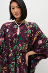Zooflora Square Kaftan features a classic, effortless silhouette with a botanical print, kimono sleeves, and a fun, high-end sash for versatile styling.