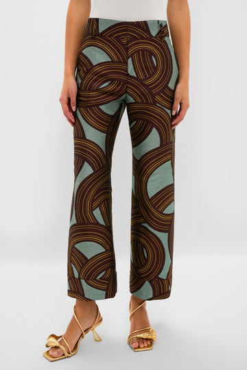 Montecarlo Jacquard Hendrix Pants with bold circular print, worn by a model with strappy sandals. Classic, high-end style for effortless fun and festive flair.