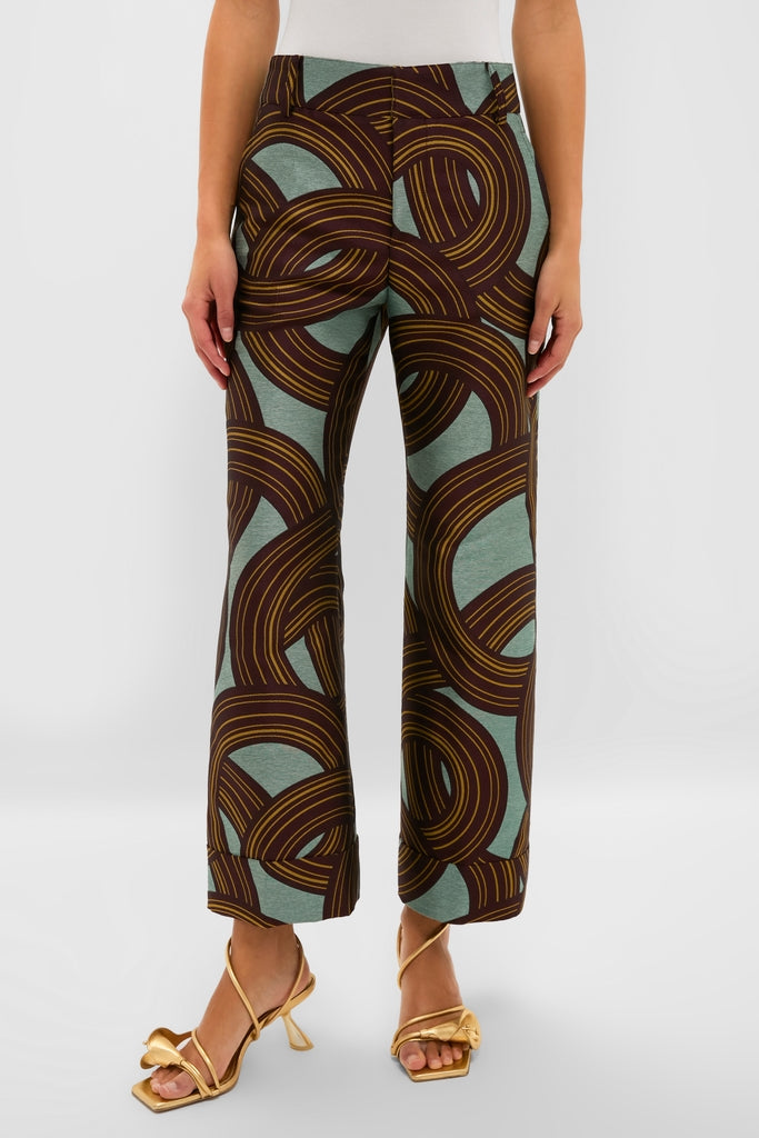 Montecarlo Jacquard Hendrix Pants with bold circular print, worn by a model with strappy sandals. Classic, high-end style for effortless fun and festive flair.